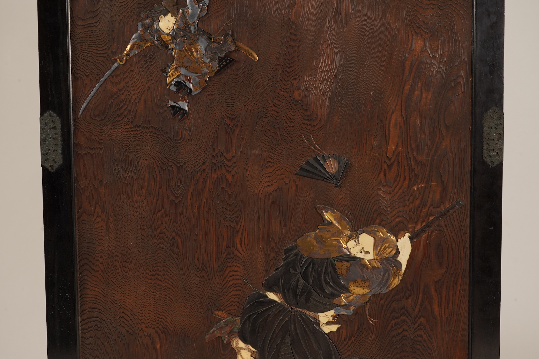 A Japanese inlaid persimmon wood tsuitate screen panel, Meiji period, possibly Tokyo School